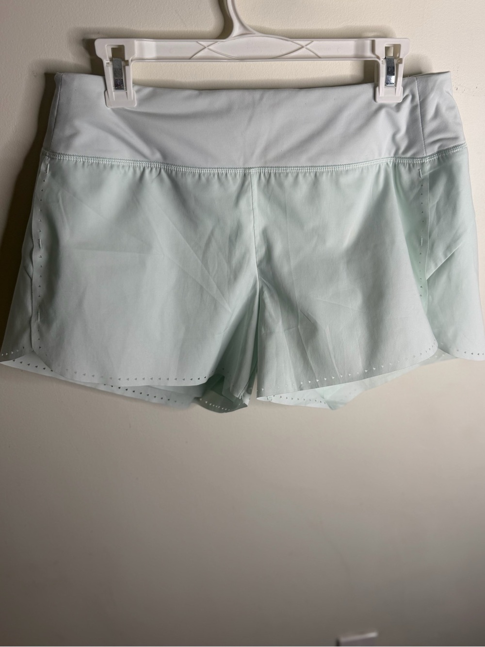 Athleta Mint Green Athletic Shorts with Laser-Cut Hem